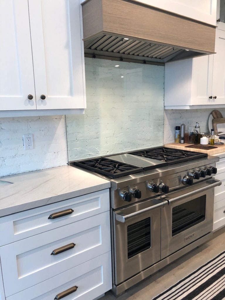 Tempered Glass Kitchen Backsplash with blue hue